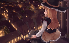 Девочка сидит на крыше