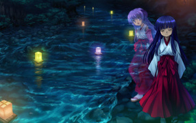 Фонарики плывут по реке