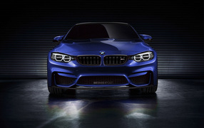 Blue BMW M4 in the garage