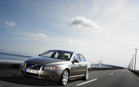 Grey Volvo S80 on the road