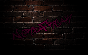 NerdFreak brick wall graffiti shadows wallpaper