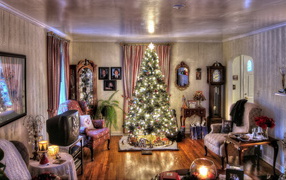 Decorated Christmas tree in a cozy room on Christmas