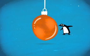 Пингвин и оранжевая ёлочная игрушка на рождество