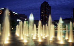 Luminous fountain at night