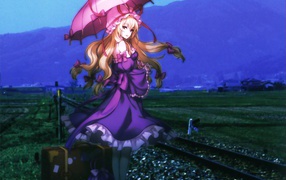 Девушка ждет поезд