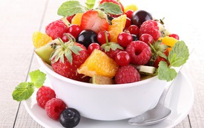 Fruit salad in a white Cup