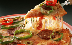 	 Pizza with sausage and pepper and cheese