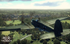War Thunder war plane is flying to the city
