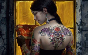 Girl tattoo with a book