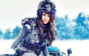 Girl in a fur coat and hat
