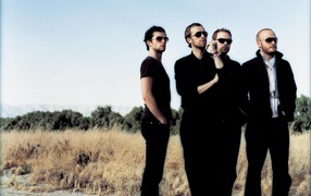 Coldplay wearing black