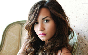 Demi Lovato in a chair