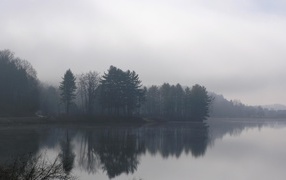 The lake in foggy morning