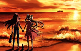 Two girls on the sea shore