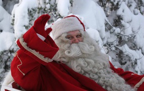 Santa Claus carries gifts