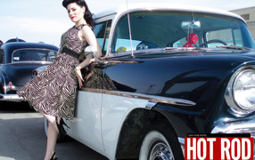 Pin Up girl near retro car from the past