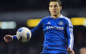The player of Chelsea Eden Hazard with a ball