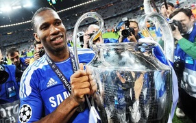 The player of Galatasaray Didier Drogba and his own trophy