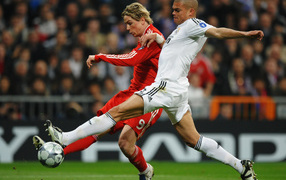 The player of Real Madrid Pepe trying to take the ball