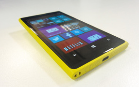 Yellow new Nokia Lumia 1020 on white table