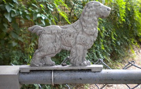 Stone figure of a spaniel