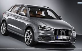Автомобиль Audi q3 на дороге
