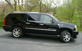 Черный Cadillac Escalade 2014