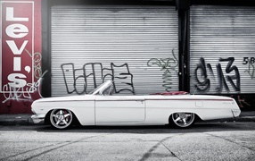 	   White Chevrolet Impala