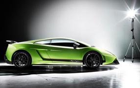 	   Green Lamborghini around lamp