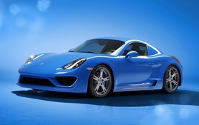 Голубой Porsche Cayman Moncenisio