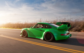 Sporting a green Porsche.