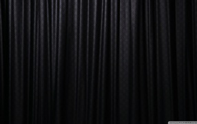 Black curtain on the wallpaper