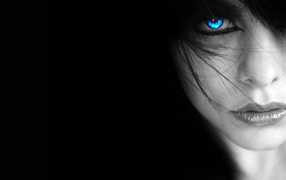 Black wallpaper with a blue-eyed girl