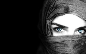Black wallpaper with a girl in a burqa