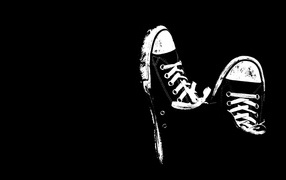 Black wallpaper with sneakers