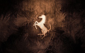 Bысеченая на камне лошадь