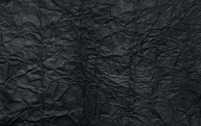 Мятая черная бумага