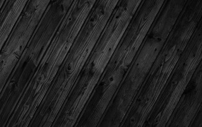 Wood texture on black wallpaper