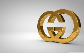 Золотой символ Gucci