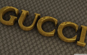 Золотые буквы Gucci