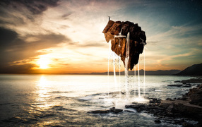 Человек стоит на скале