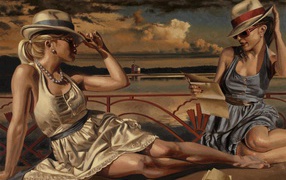 Девушки отдыхают на берегу озера