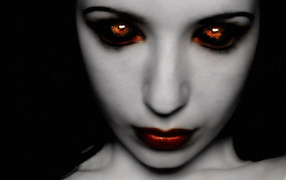Fiery eyes of the girl vampire