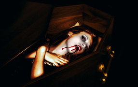 Girl vampire in the coffin