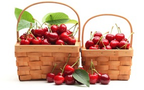 Two baskets with cherries