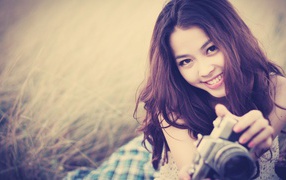 Девушка с фотоаппаратом