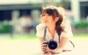 Девушка с фотоаппаратом