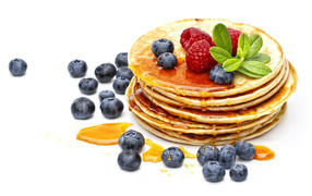 Pancakes with raspberries and blueberries on Shrove Tuesday