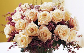 Beautiful bouquet of white roses for a girl on March 8