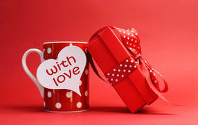 Cup with a gift on Valentine's Day February 14
